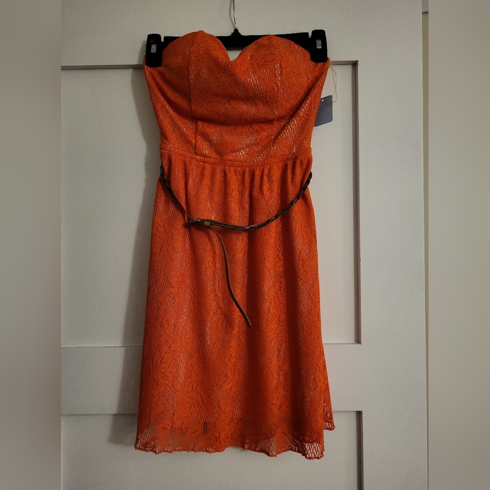 Coral colored lace dress, strapless with belt